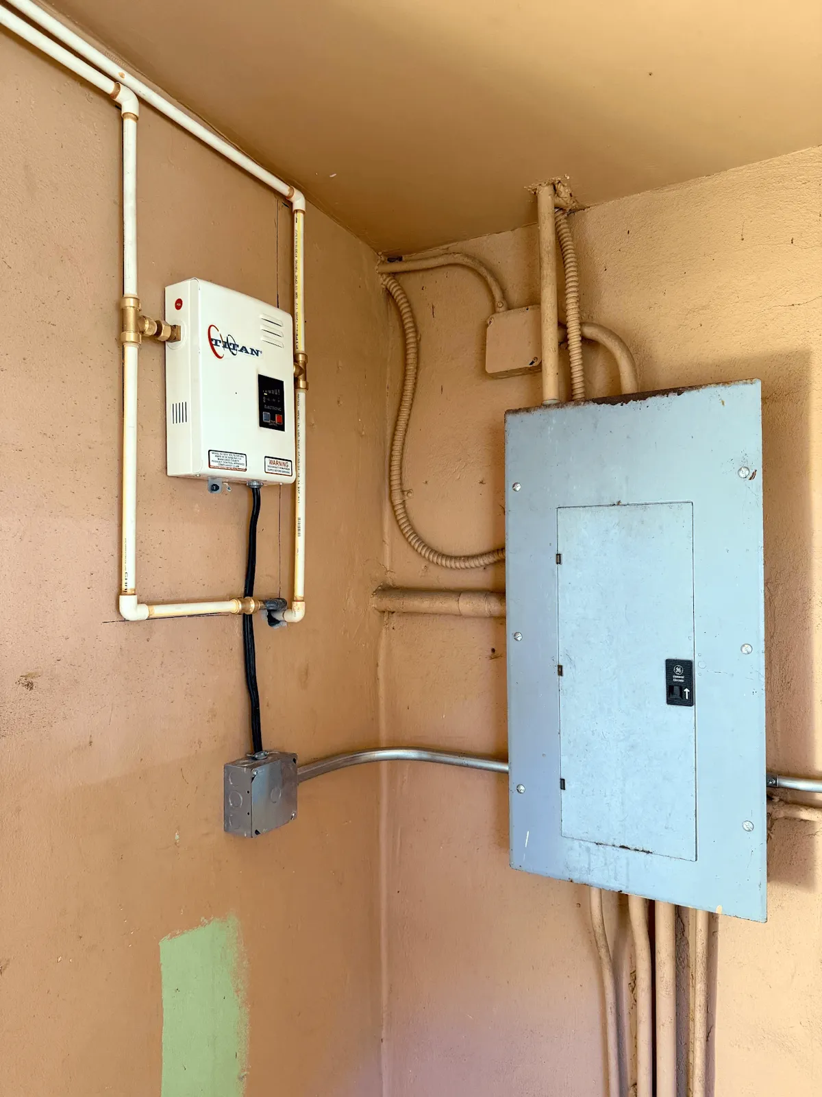 Surge protection device installed beside a residential subpanel