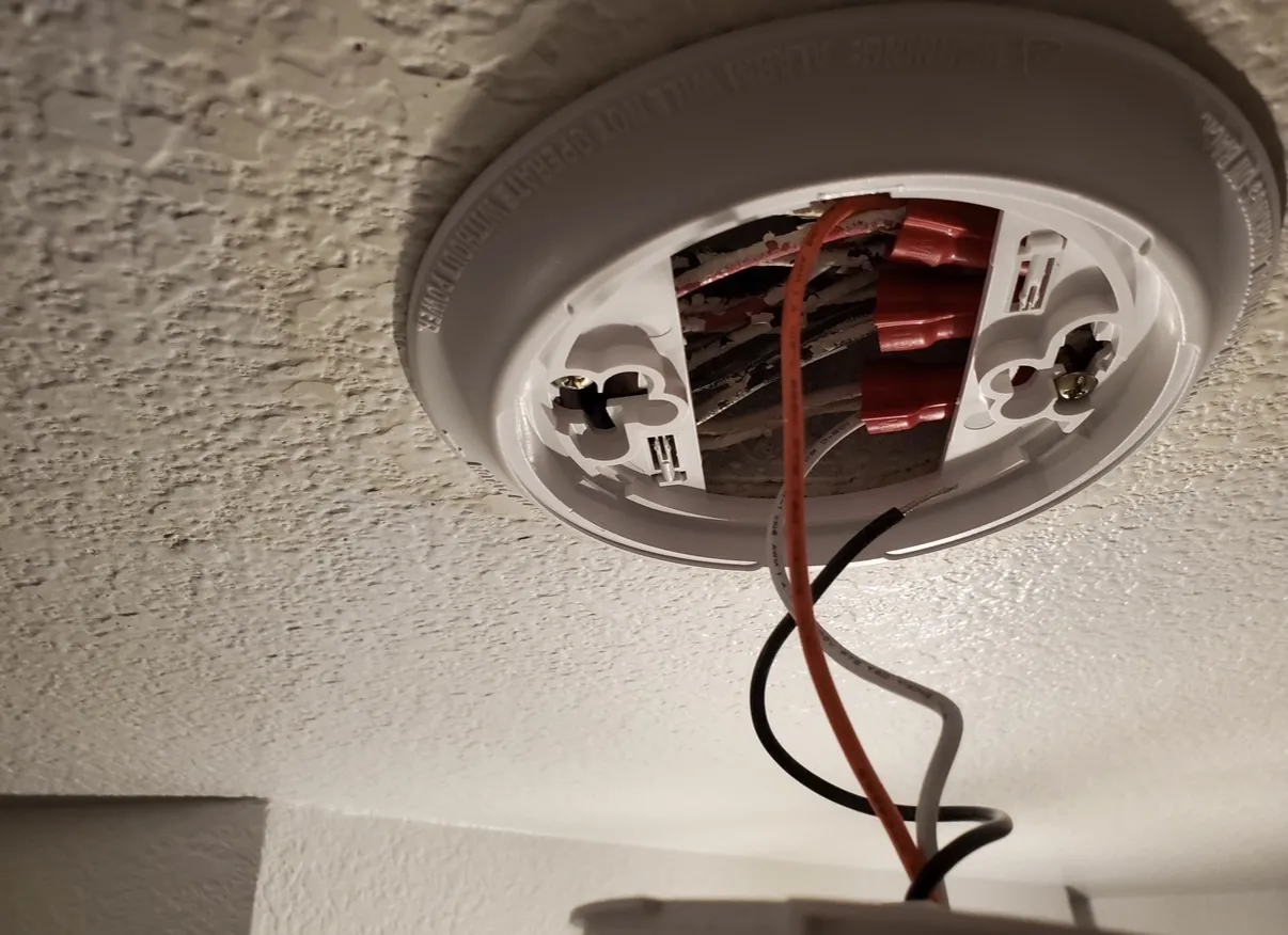 Ceiling junction box wiring prepared for a new light fixture