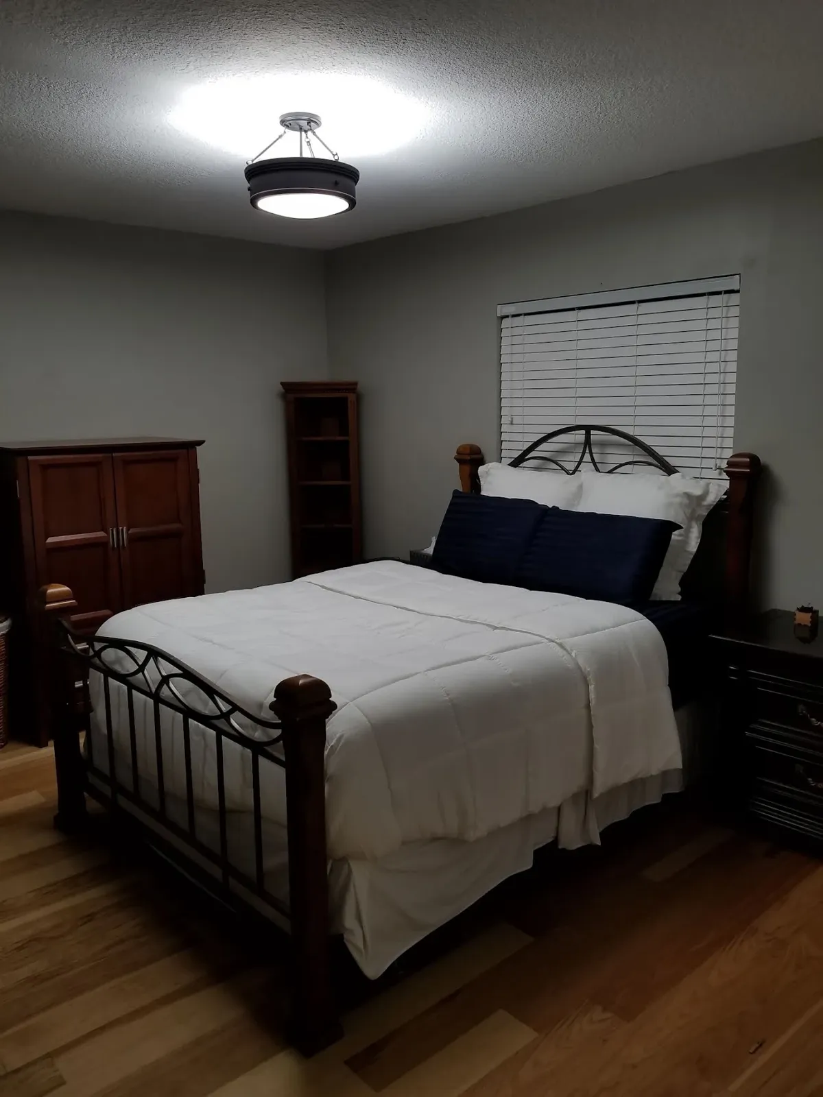 New ceiling light fixture installed in a bedroom